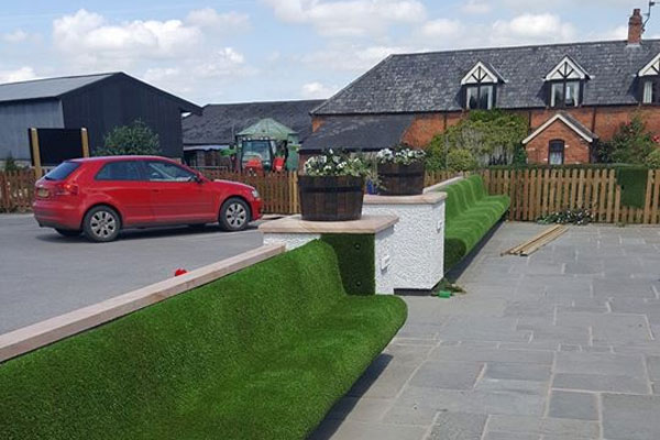 Artificial Grass Seats at Carden Arms in Cheshire
