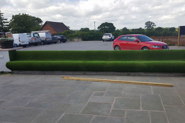 Artificial Grass Seats at Carden Arms in Cheshire