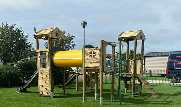 Outdoor slide and climbing frame