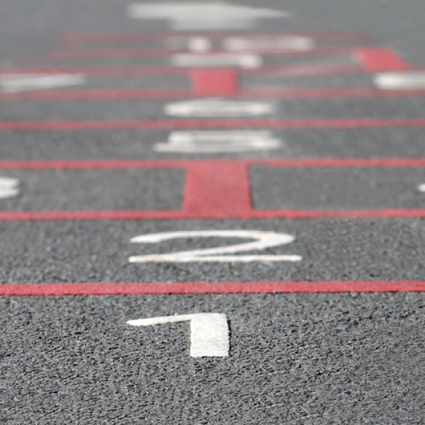 The writing’s on the floor! Marking on playgrounds for fun games